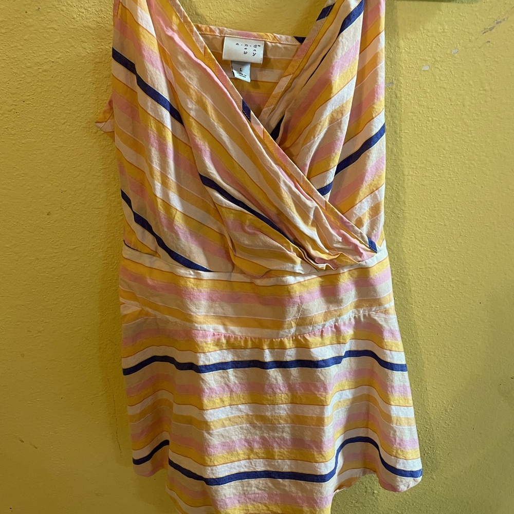 Body fitting tank top that wraps and ties in the back for a snatched finish ❤️
